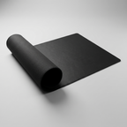 Deskstead Desk Pad with a corner lifted showing the non-slip underside