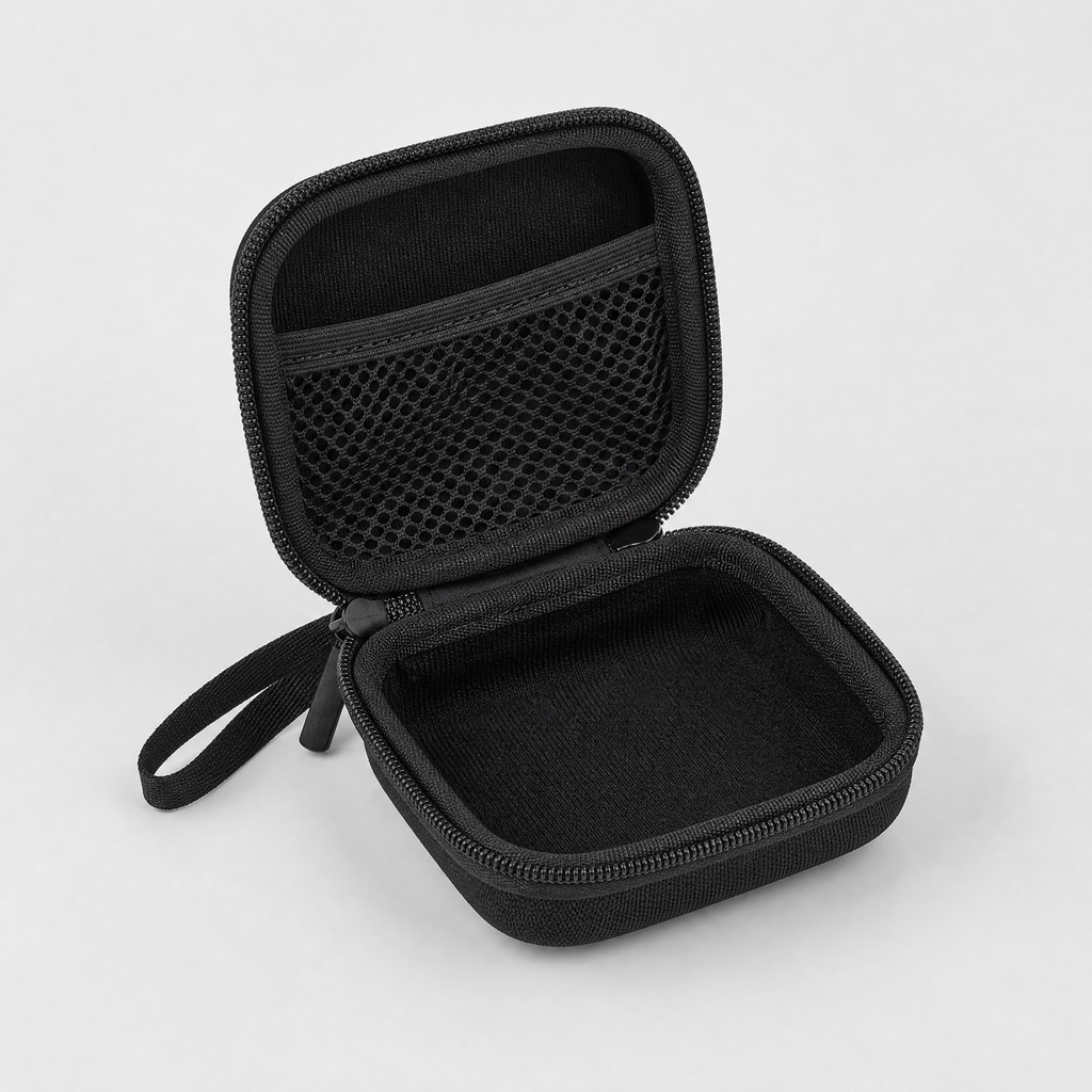 The travel case open, showing the mesh pocket in the lid