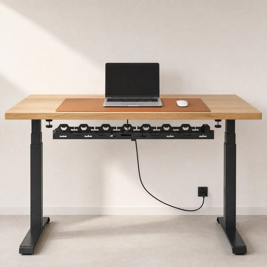 A desk with the Edge System installed and a single cable running to the wall
