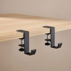 Two Deskstead Edge Hooks clamped along a desk edge