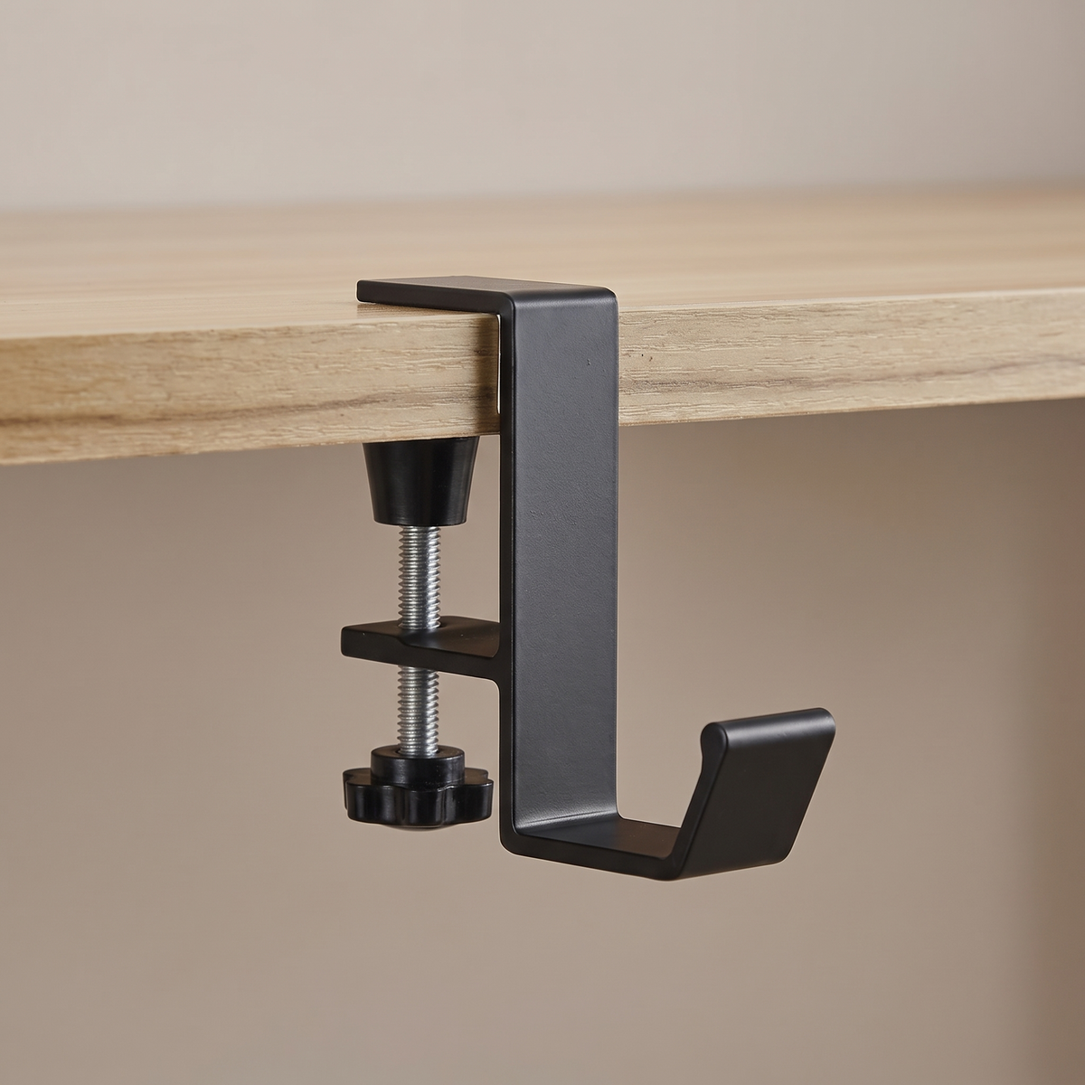 Deskstead Edge Hook clamped over a desk edge