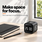 The Block Pro on a desk beside a notebook and pencil