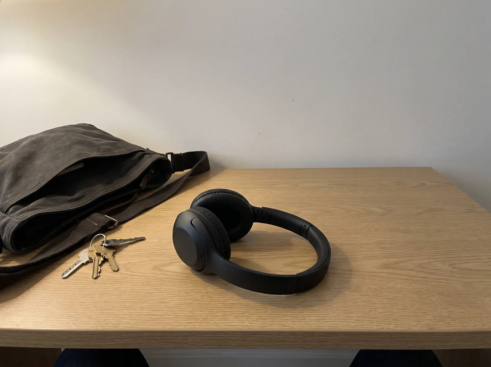 Half your desk is storage you never asked for.